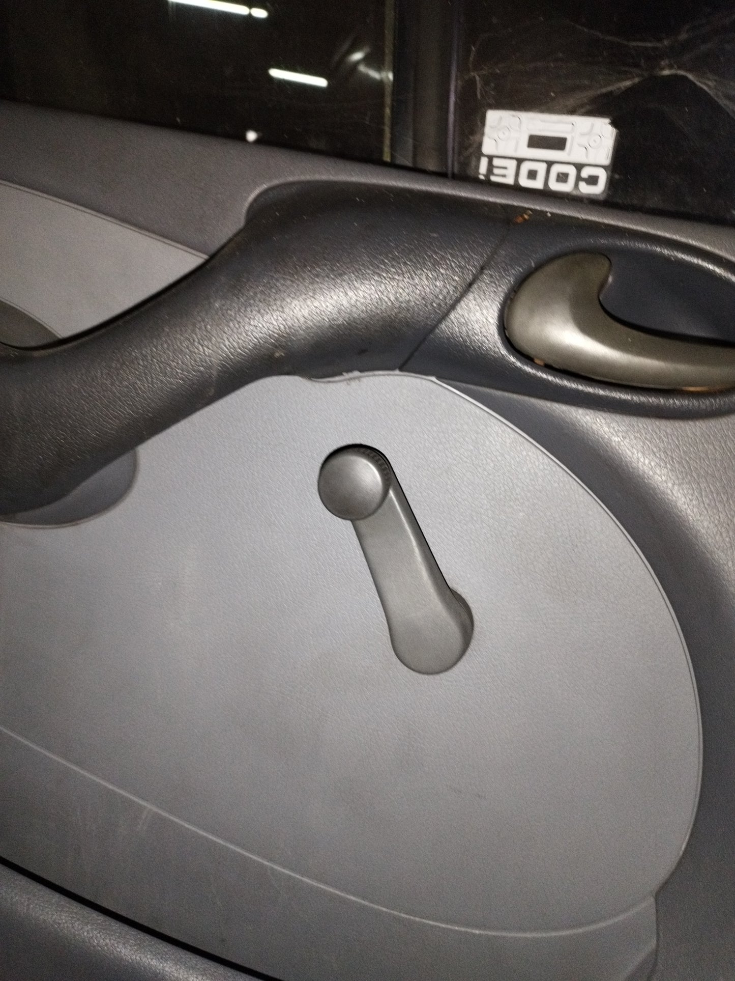 Elevador manual de porta